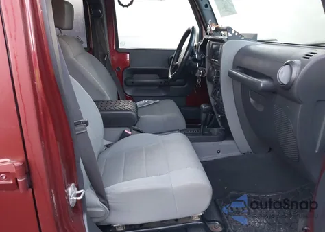 2007 Jeep Wrangler Unlimited Sahara from USA, damaged, VIN 1J8GA59157L157934